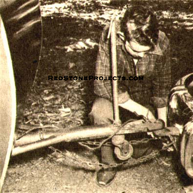 Standard hitch connects trailer and car. Threaded caster levels body floor when parked.